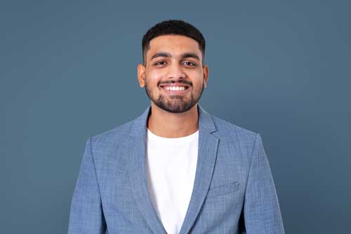 Portrait of successful trader Amit Patil looking professional